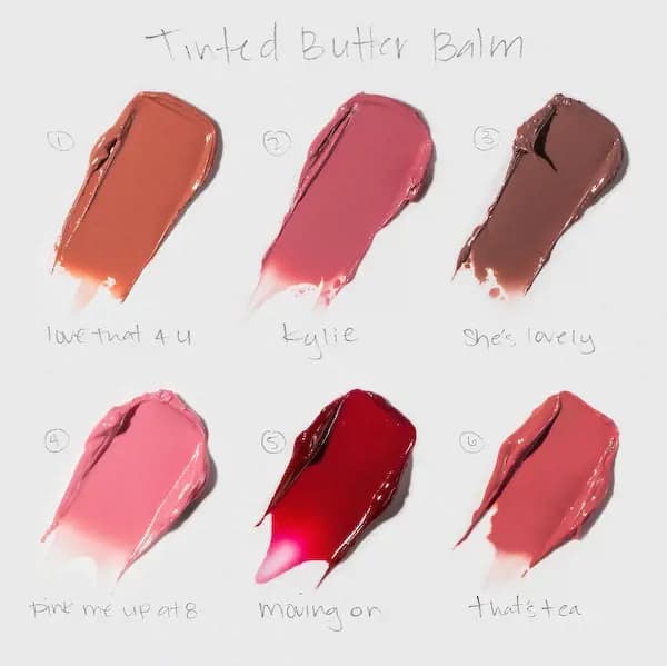 Handwritten swatch chart of Kylie Cosmetics Tinted Butter Balm in Love That 4 U, Kylie, She's Lovely, Pink Me Up At 8, Moving On and That's Tea