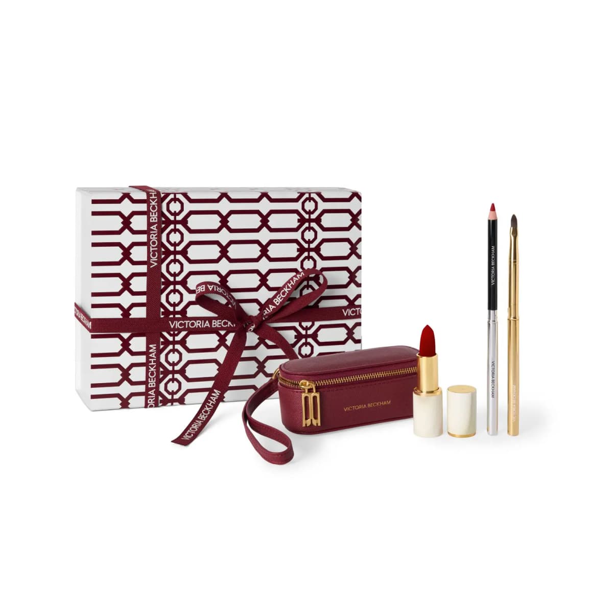 Victoria Beckham gift set: patterned box with ribbon, burgundy zip pouch, red lipstick, lip liner and brush