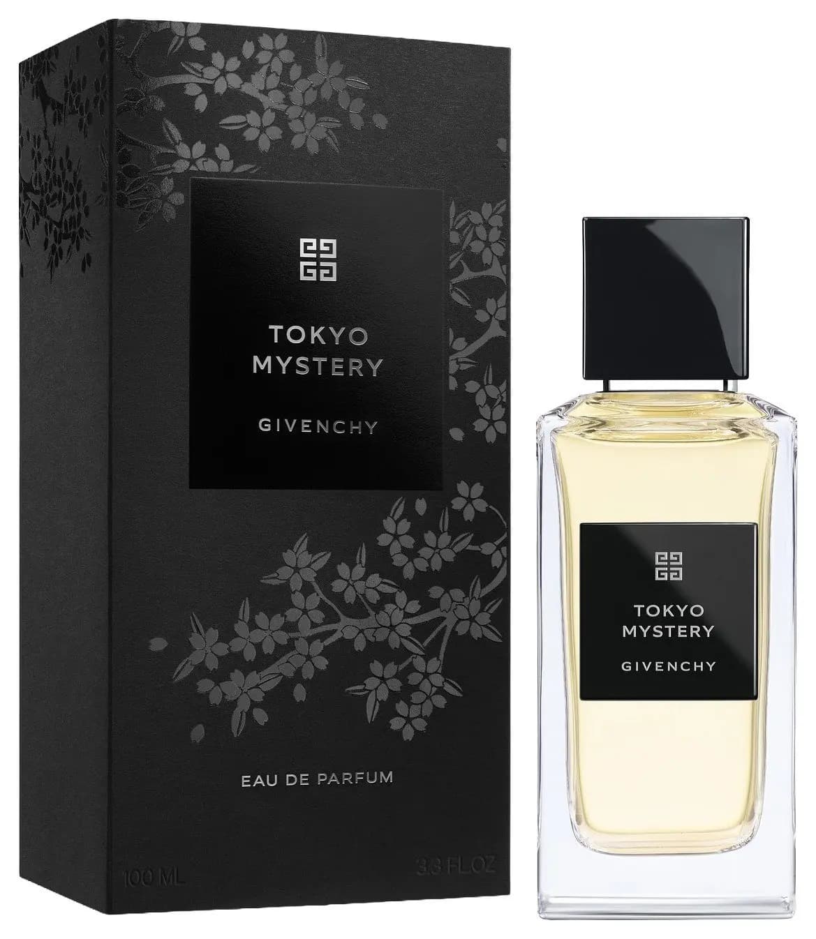 Pale gold perfume bottle beside a black box embossed with cherry blossom branches, labelled Eau de Parfum 100 ml