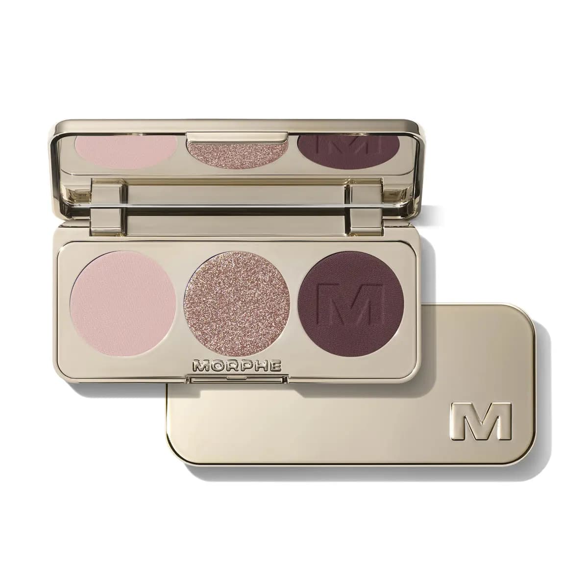 Gold Morphe eyeshadow trio with matte pale pink, glittery taupe and matte deep plum shades beside its lid