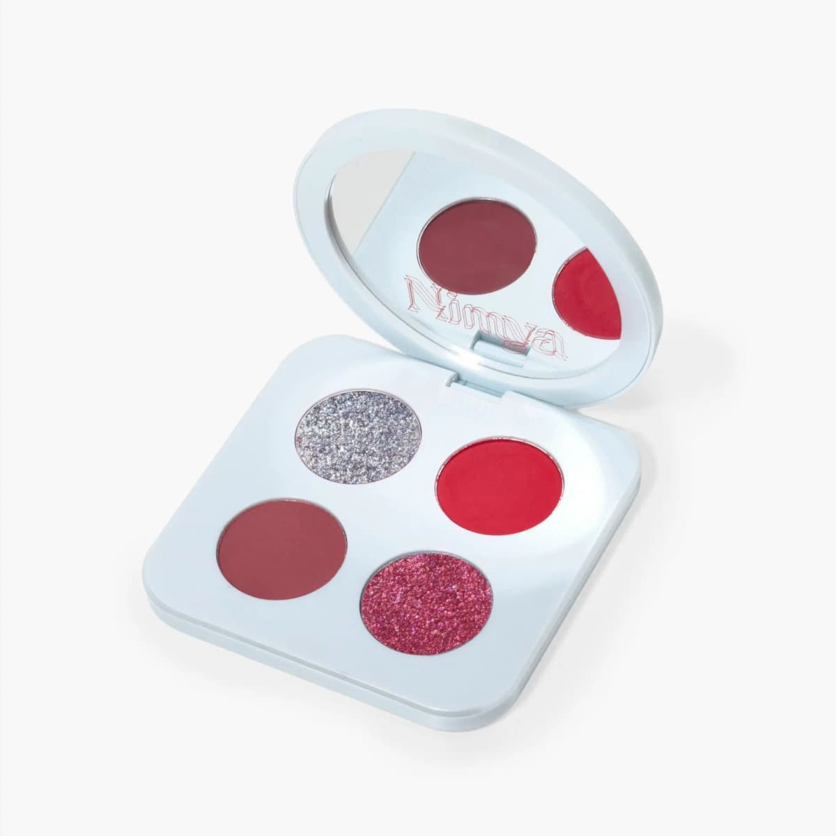 Open pale blue quad with mirrored lid showing silver glitter, bright red, burgundy and berry shimmer pans on white