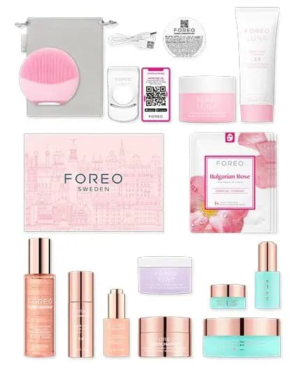 Flat lay of LUNA 4 mini Edition contents: pink cleansing device, pouch, Bulgarian Rose mask, LUNA balm and serums