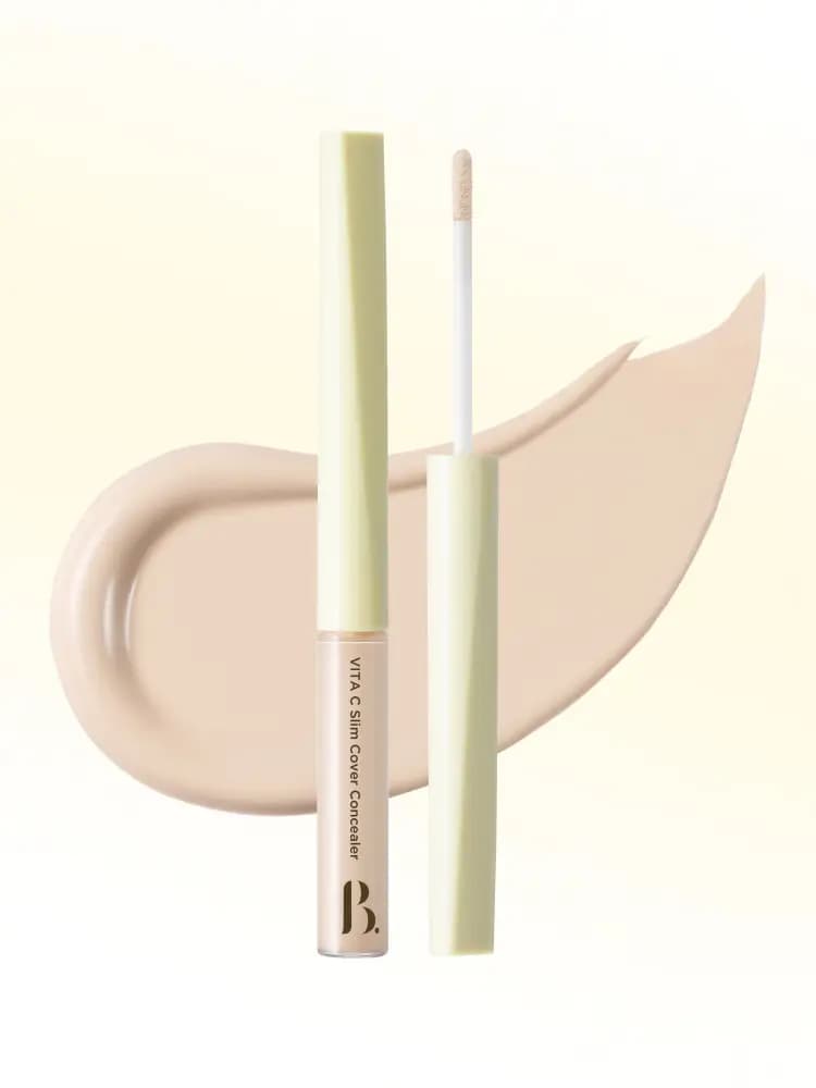 Vita C Slim Cover Concealer with pale green cap, doe-foot applicator and a light beige swatch