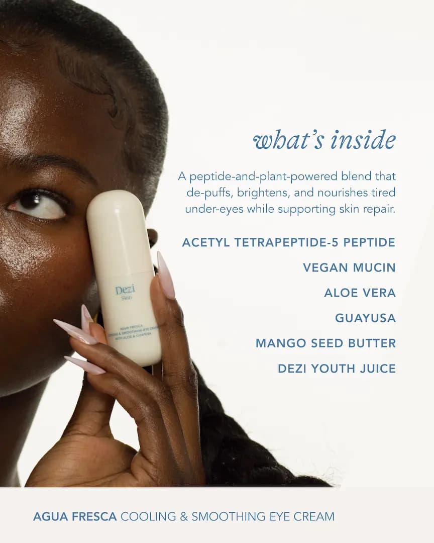 Model holds the white eye cream tube against the cheek beside a list of key ingredients on a white background