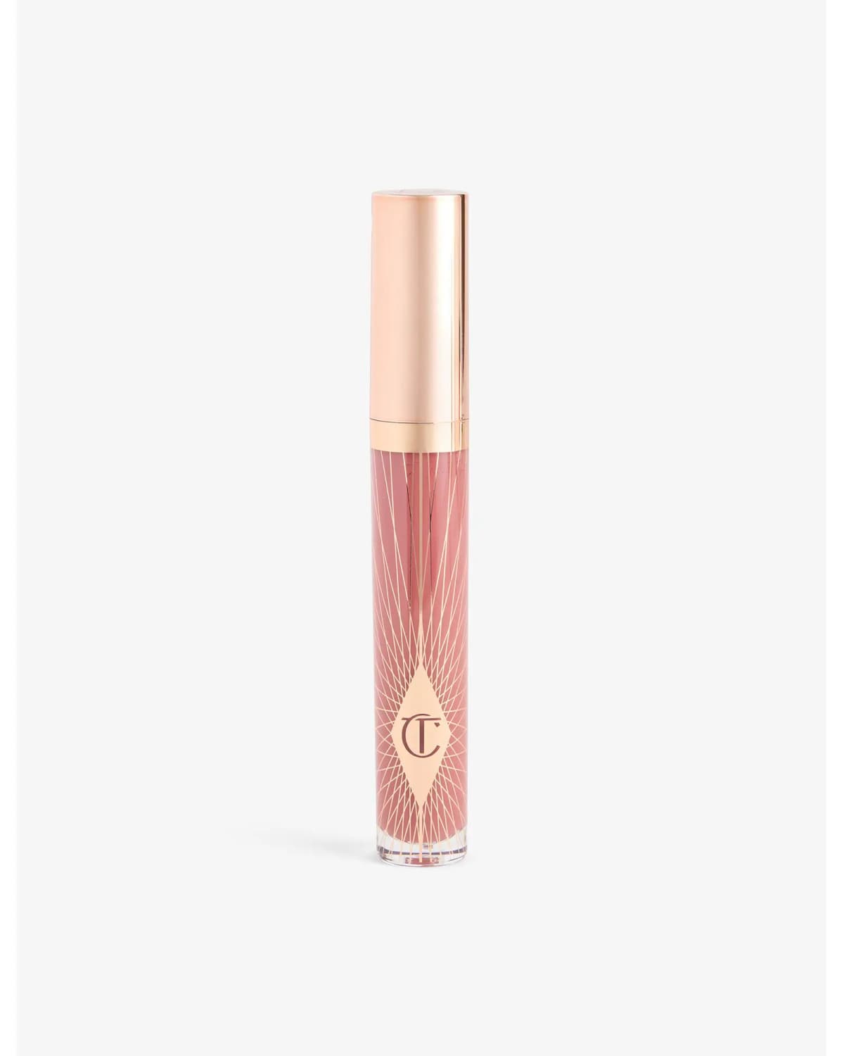 Charlotte Tilbury lip gloss tube in rose-pink with rose-gold cap and starburst CT logo