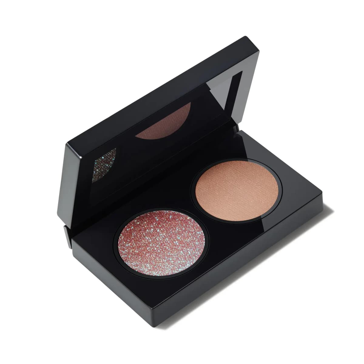 Open black mirrored compact holding a rose-pink sparkling glitter shadow and a shimmery peach shadow.