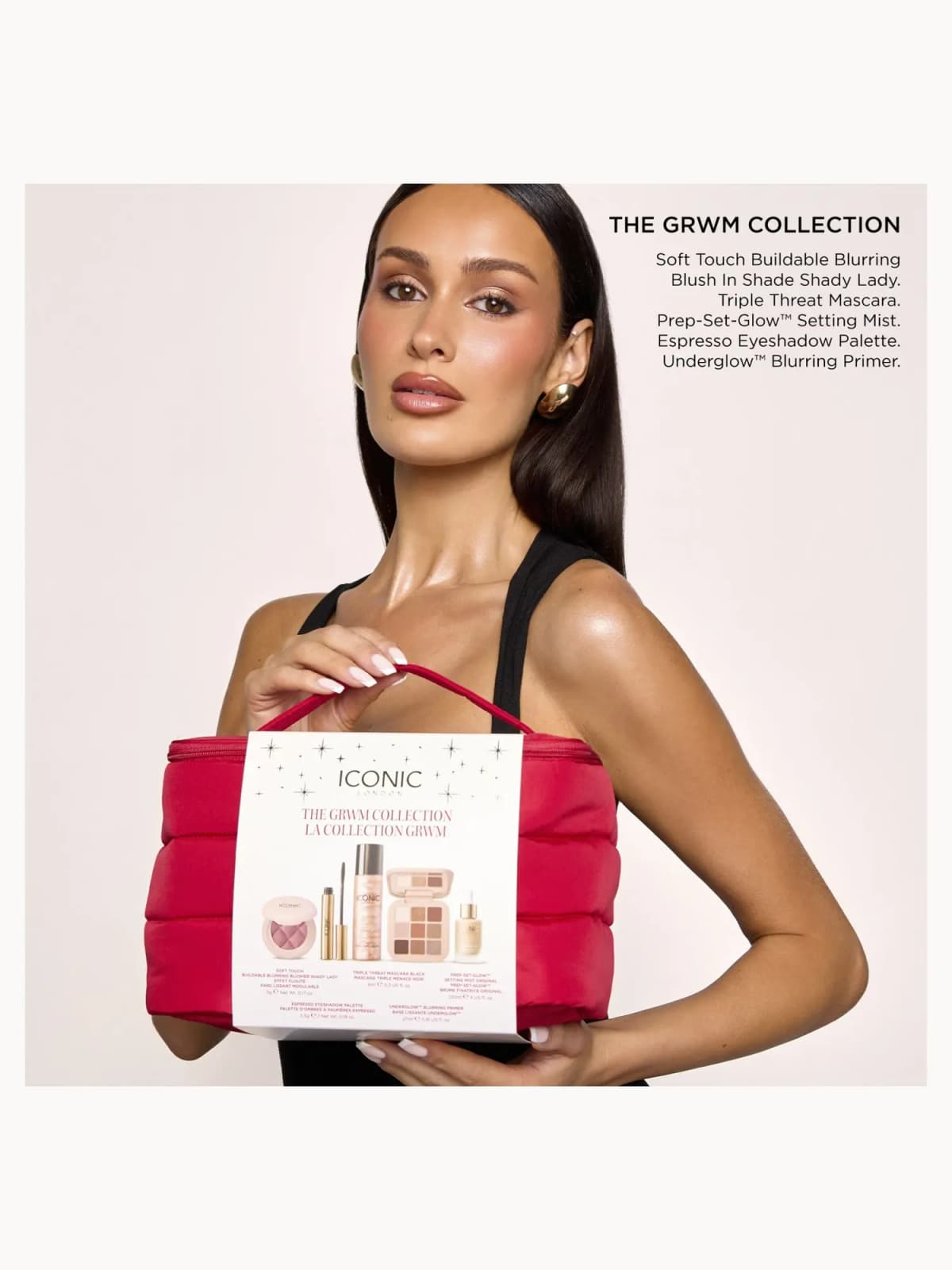 Brunette model in black top holding red quilted GRWM Collection vanity case, with product list on the right