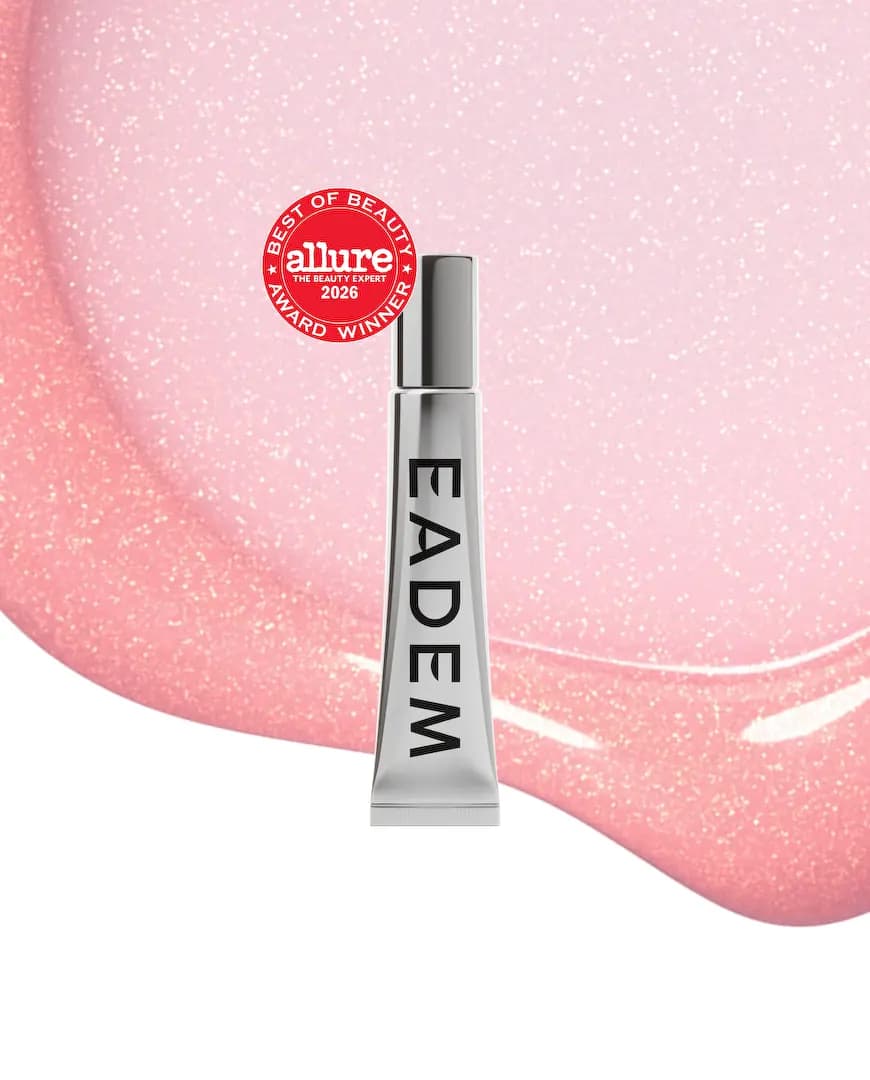 Award-badged silver tube over a sheer pink balm swirl flecked with golden shimmer