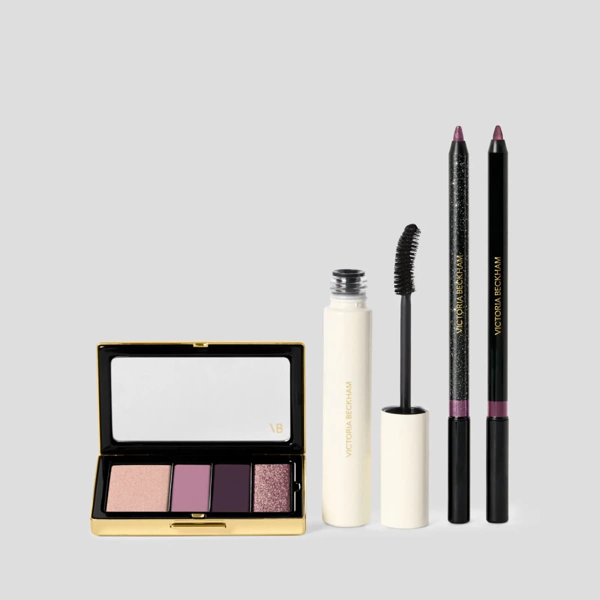 Orchid set: quad in shimmery pink, mauve, deep plum and pink glitter with mascara and two purple liners