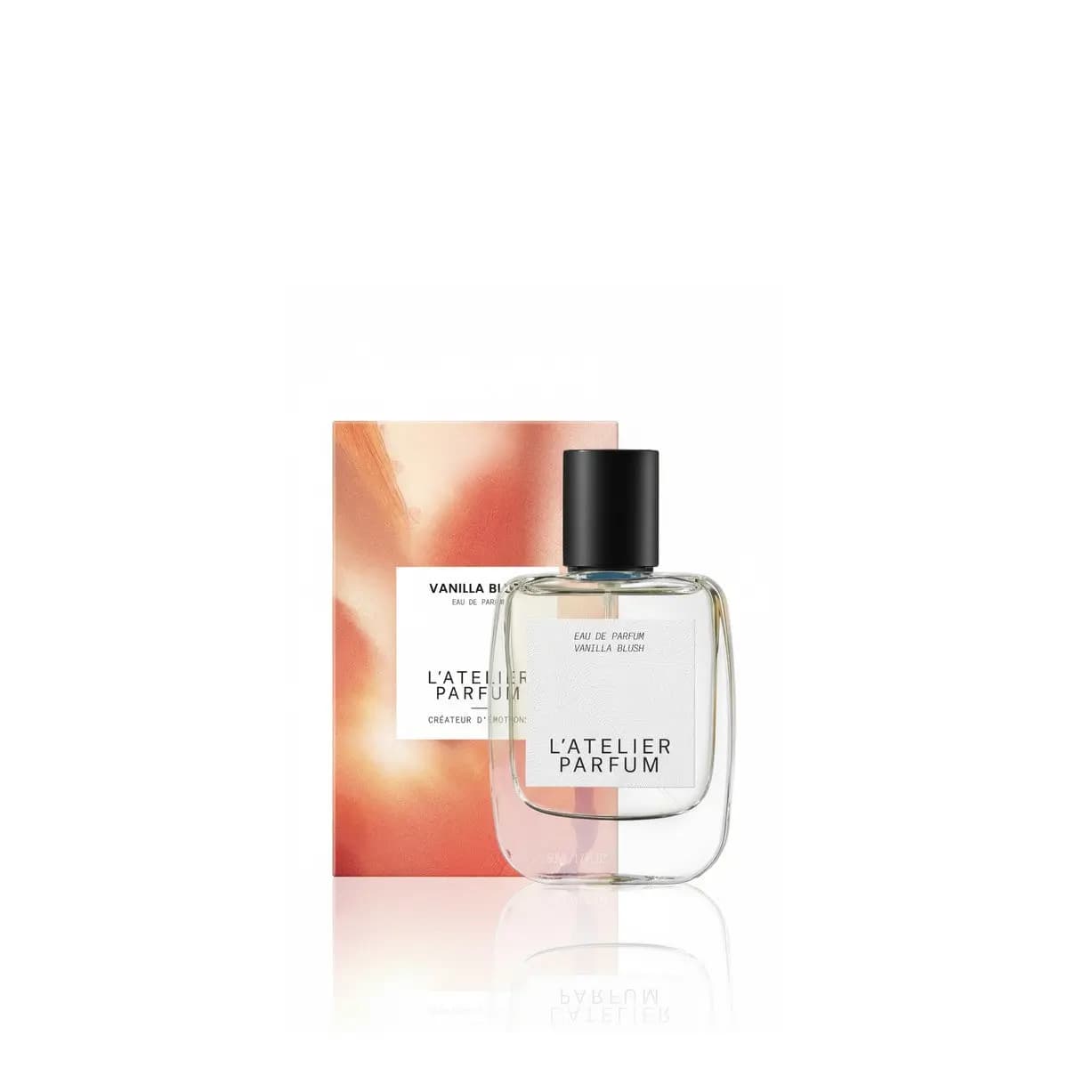 L'Atelier Parfum Vanilla Blush Eau de Parfum clear glass bottle beside its peach-orange box