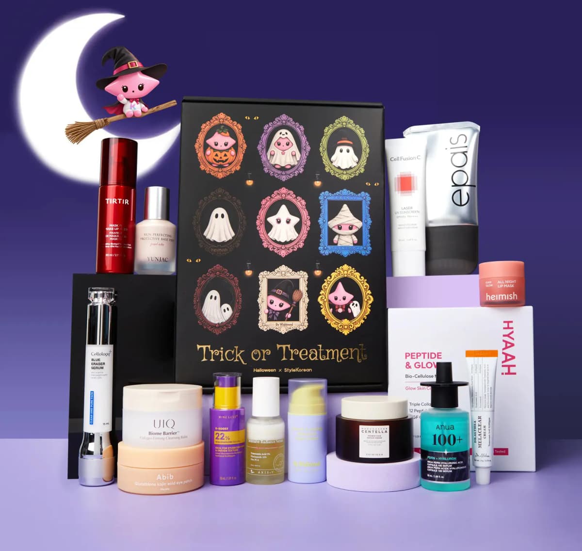 StyleKorean Trick or Treatment Box with ghost-portrait packaging, surrounded by 15 K-beauty products under a crescent moon
