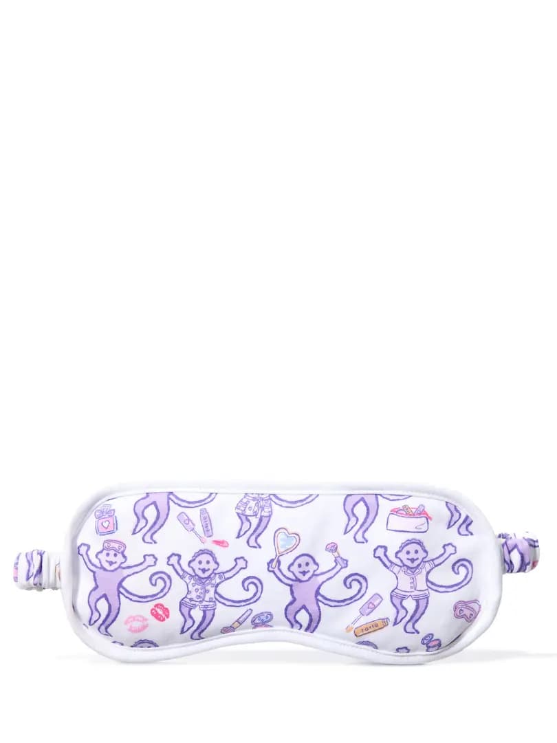 White eye mask with lavender monkey print, makeup doodles and elastic strap