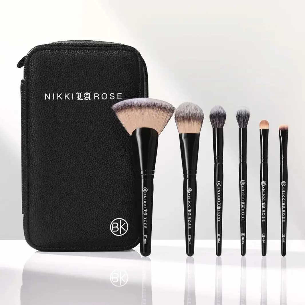 BK Beauty x Nikki La Rose Pro Artist Series Travel Set: six black-handled brushes beside black vegan leather zip case