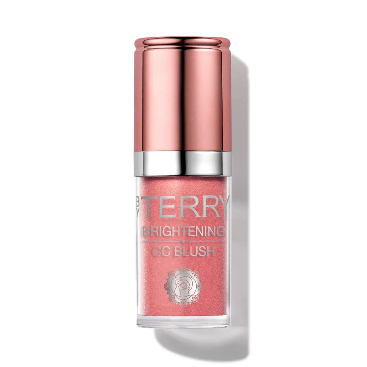 By Terry Brightening CC Blush in a warm rosy coral with fine shimmer, rose-gold cap, on a white background.