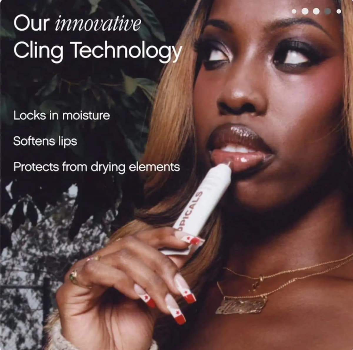 Model with glossy lips holds a white Topicals tube beside text about Cling Technology locking in moisture