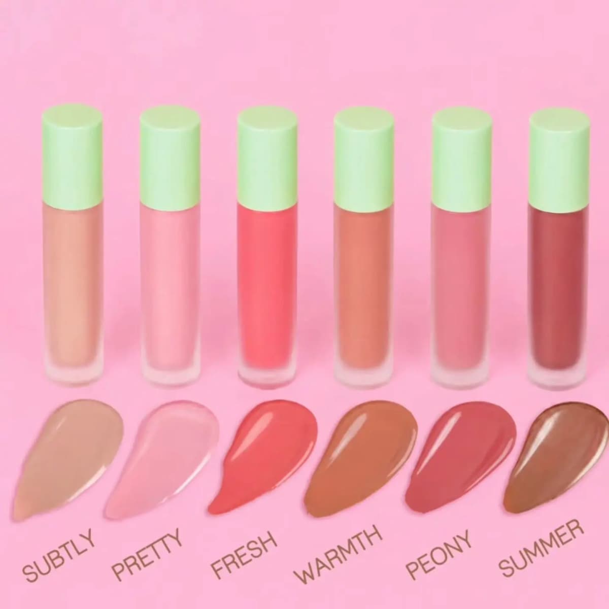 Six LiquidGlow Blush tubes standing in a row above their glossy droplet swatches labeled with each shade name.