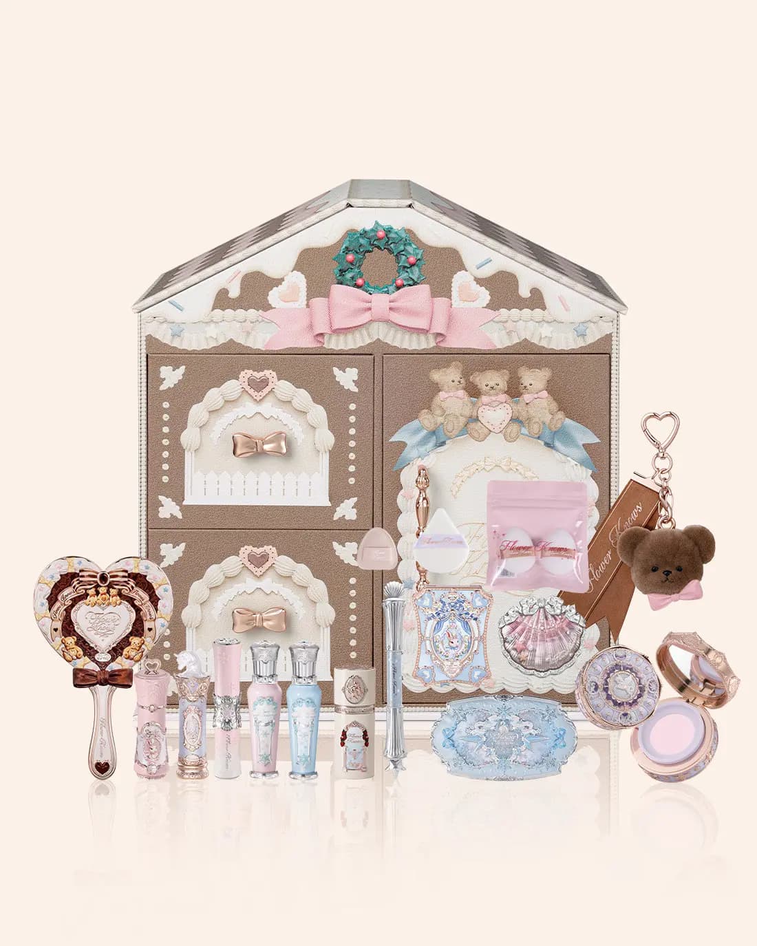 Flower Knows Dreamland Advent Calendar 2026 gingerbread-house gift box with lipsticks, palettes, puffs, mirror and bear charm
