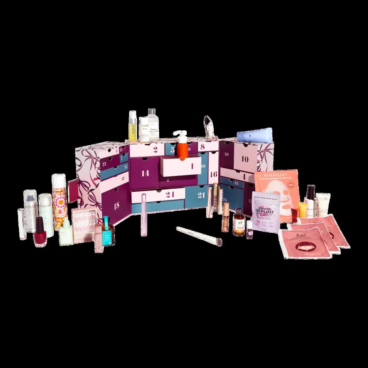 Opened Ulta 25 Days of Beauty calendar with pink, plum and teal numbered drawers, products arranged on both sides