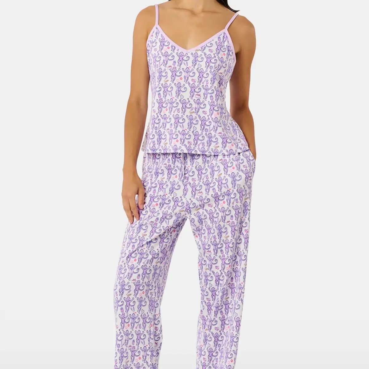 Model in matching lavender monkey-print cami top and drawstring pajama pants