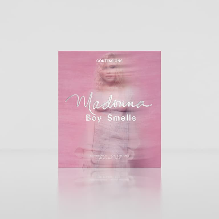 Pink Confessions candle box with a blurred blonde portrait and silver foil Madonna script logo