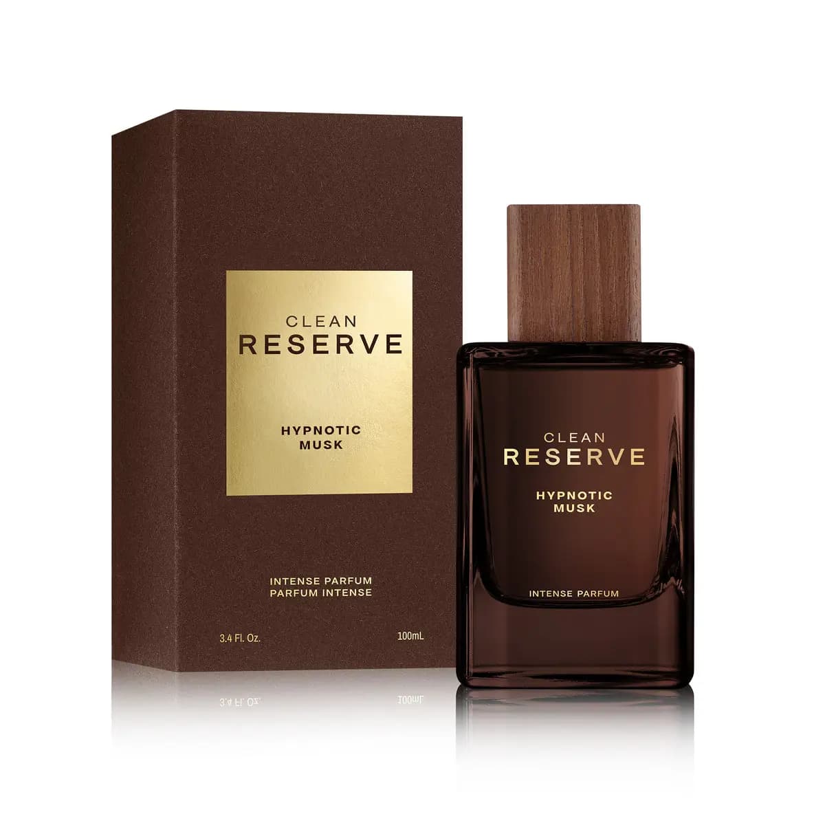 Brown Clean Reserve Hypnotic Musk Intense Parfum bottle with wooden cap next to its matching brown and gold box.