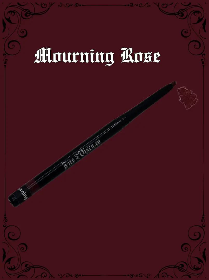 Mourning Rose retractable lip liner with a burgundy swatch on a deep wine-red background with ornate black borders