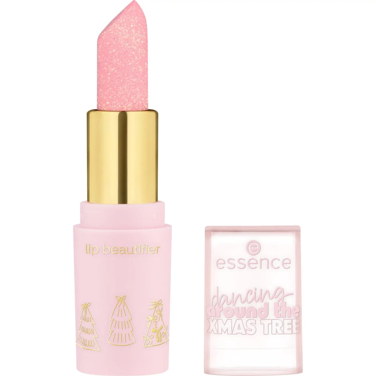 Pink shimmering lip beautifier bullet in a gold and pale pink tube with tree motifs beside its clear cap