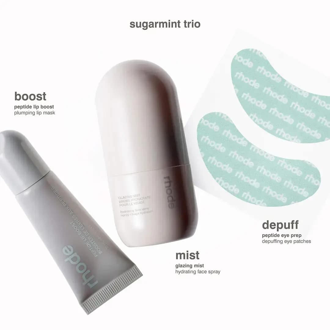 Grey peptide lip boost tube, white glazing mist bottle and mint rhode-print eye patches labelled boost, mist, depuff