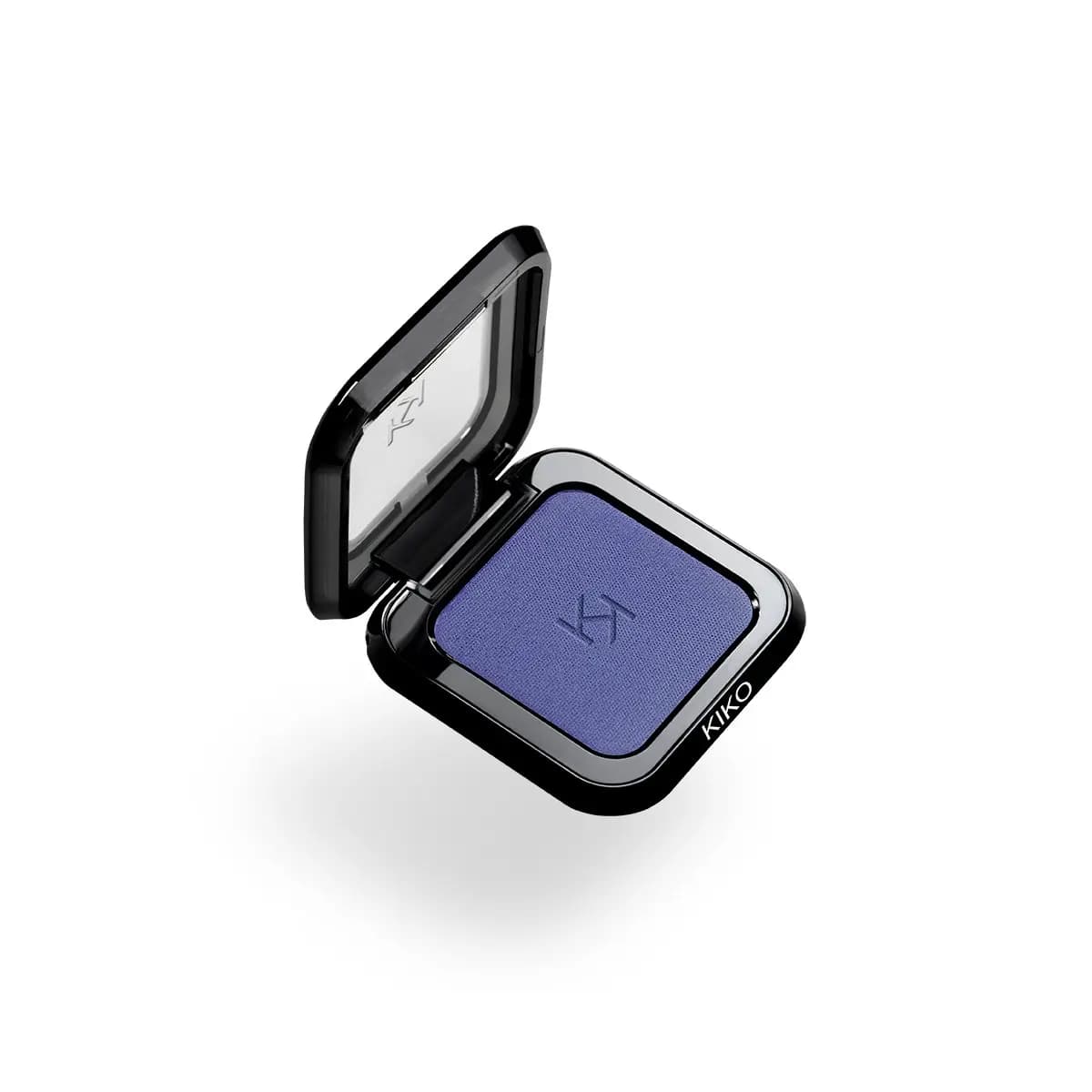 Open KIKO Maxi Mod High Pigment Eyeshadow compact in a matte indigo blue shade with clear lid and black case.