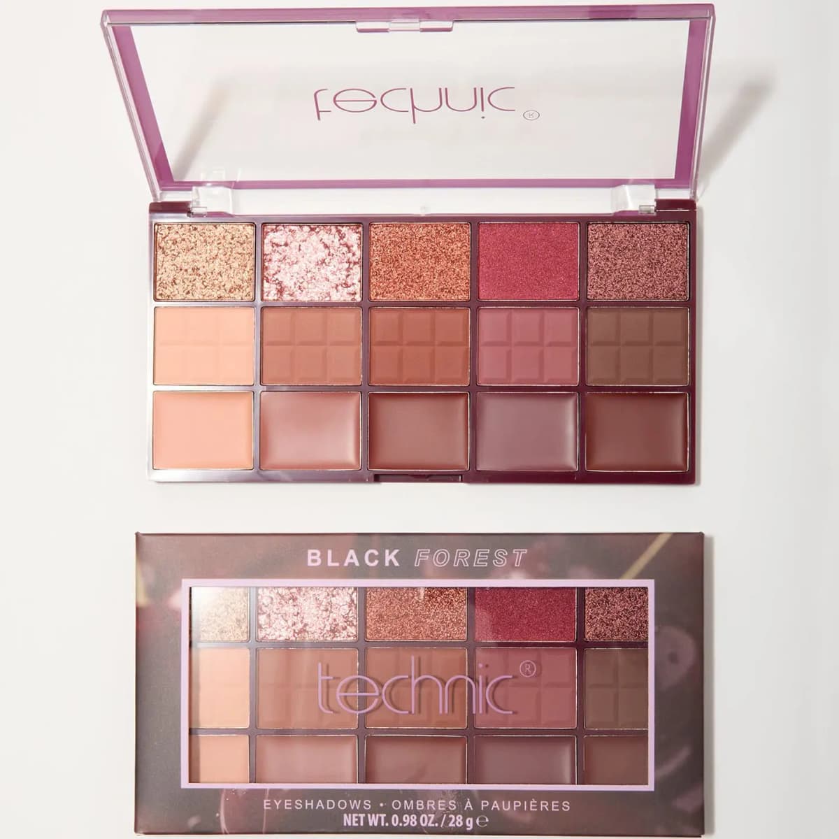 Black Forest 15-pan palette open above its box, showing shimmer, chocolate-embossed matte and cream shades