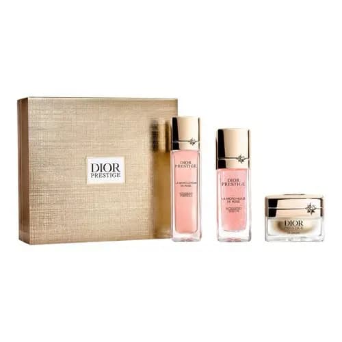 Gold textured Dior Prestige box with pink micro-lotion, rose micro-oil serum and a small cream jar