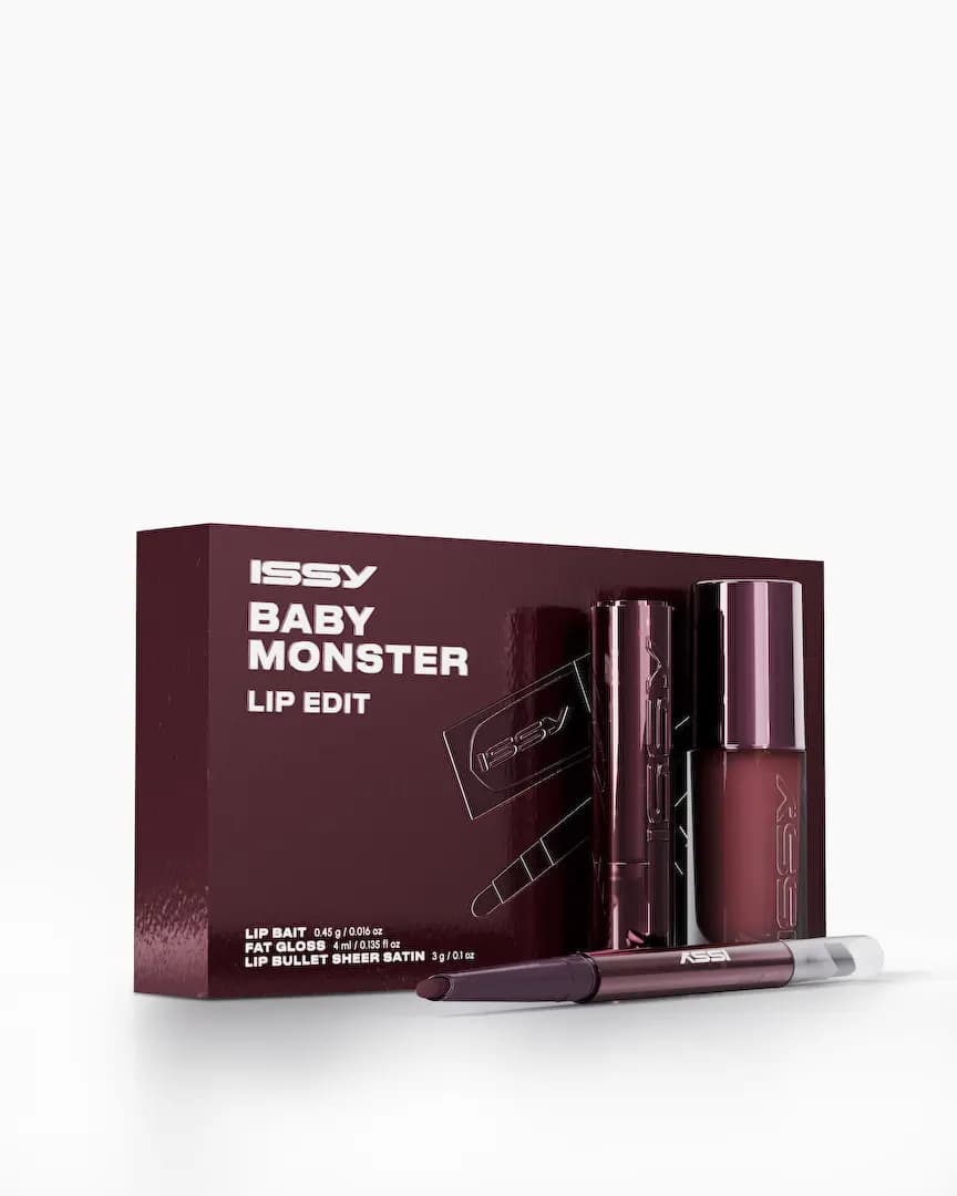 ISSY Baby Monster Lip Edit box in glossy burgundy with a dark plum Lip Bait pencil in front