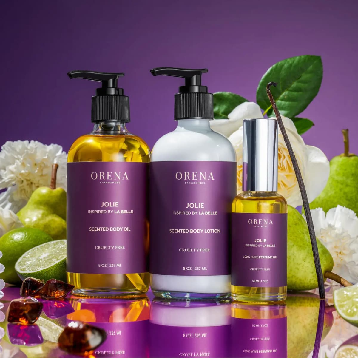 Jolie body oil, lotion and perfume oil with purple labels among pears, limes, white flowers and a vanilla pod on purple