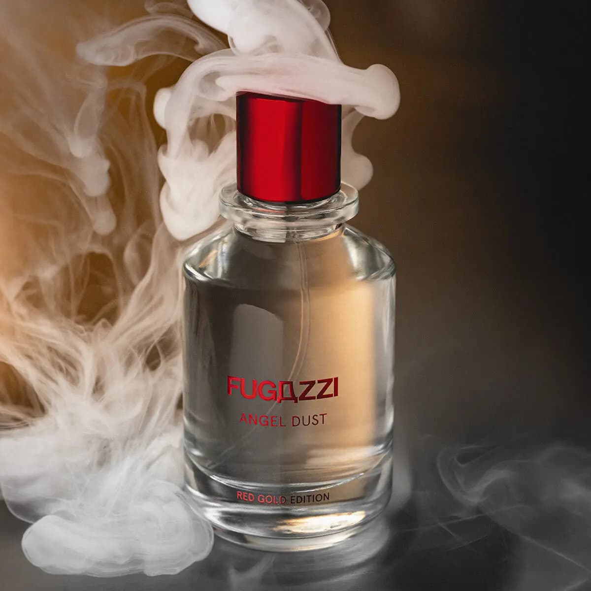 Clear perfume bottle with red metallic cap wrapped in swirling white smoke against a dark amber backdrop