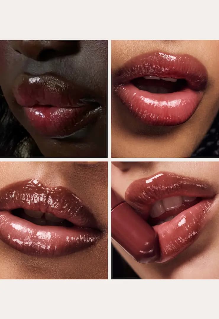 Four close-up lip swatches of a glossy reddish-brown tint across deep, tan and light skin tones