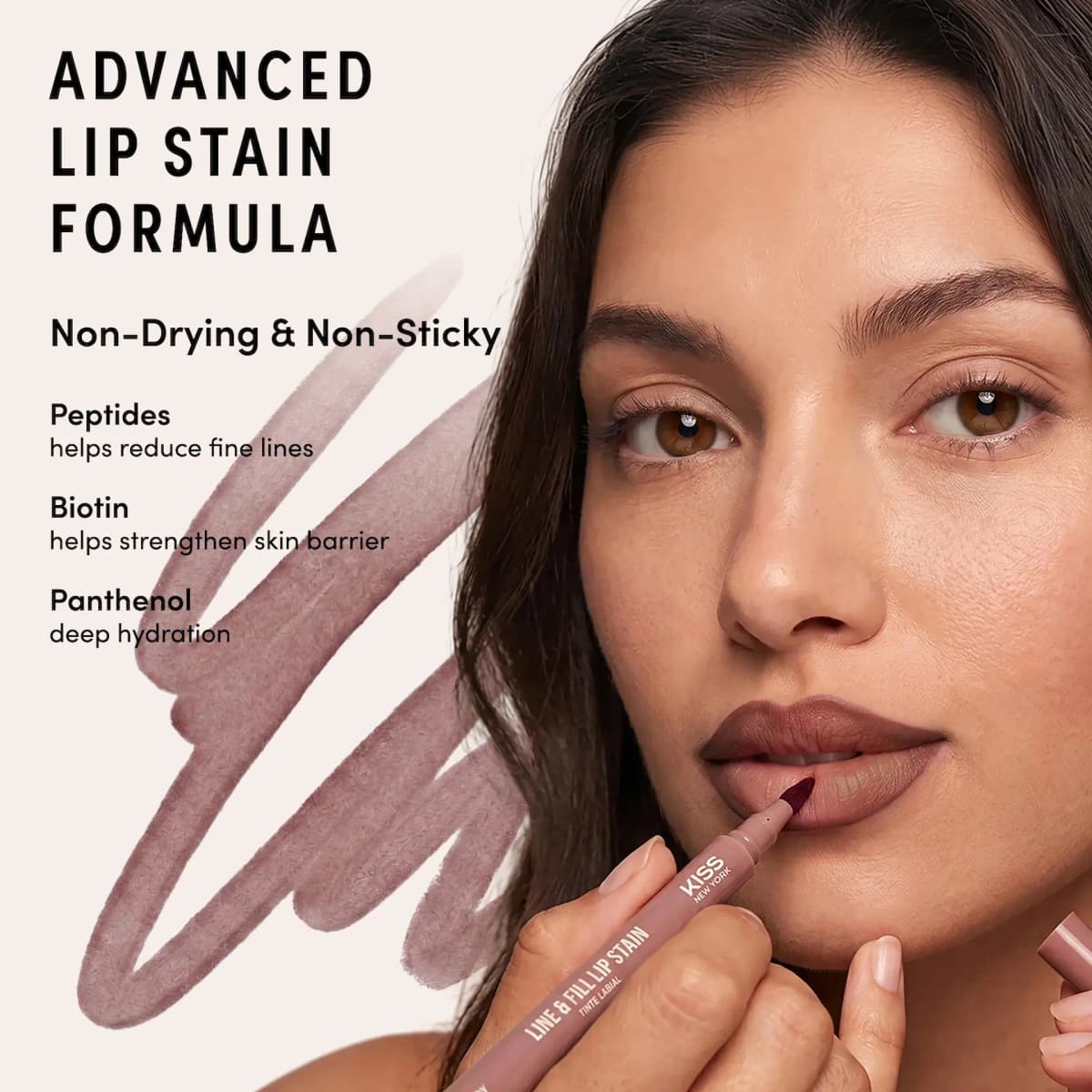 Model applying a KISS NEW YORK Line & Fill Lip Stain in a mauve brown beside peptide, biotin and panthenol claims