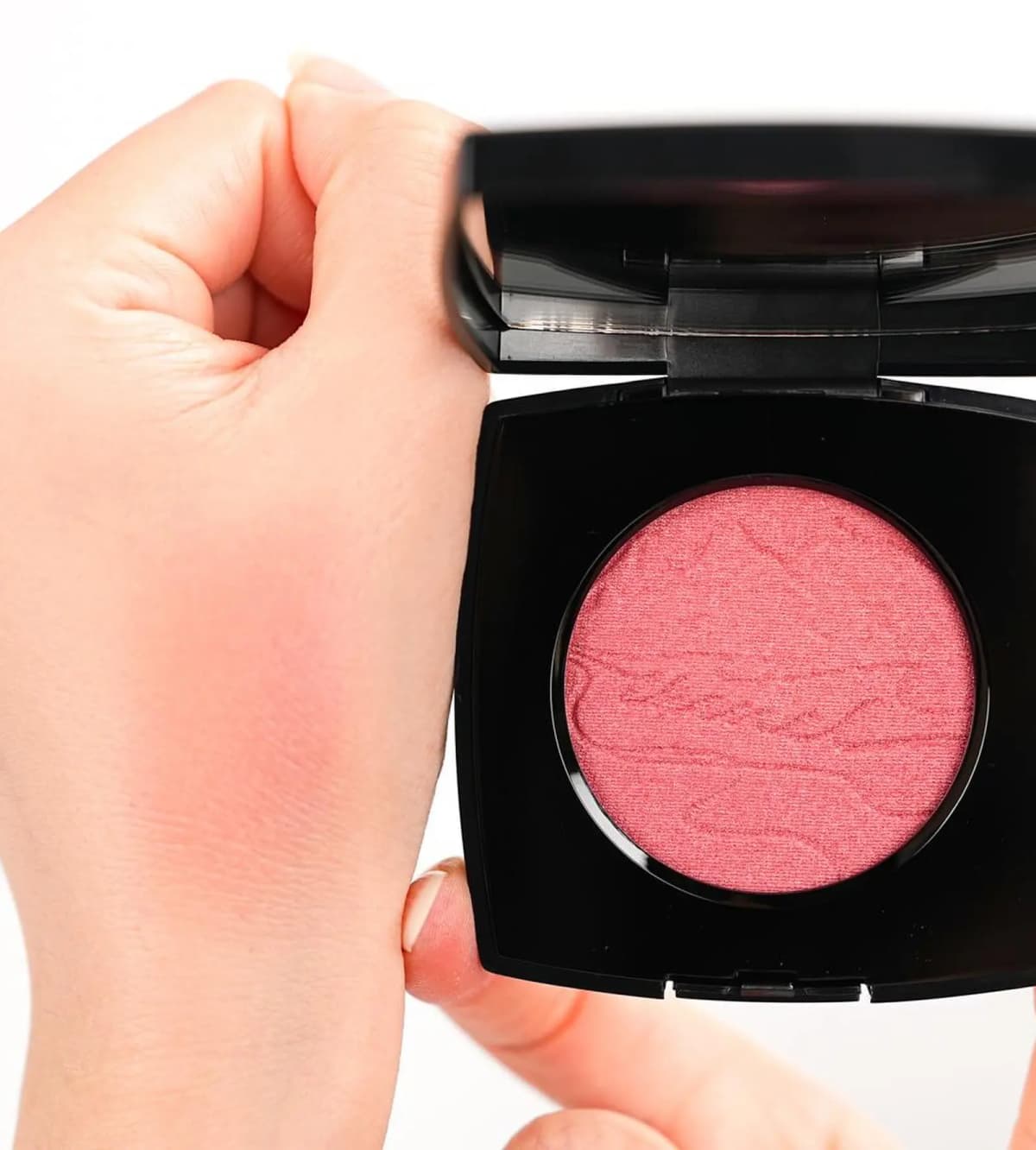 Chanel Holiday 2026 embossed pink blush with an arm swatch