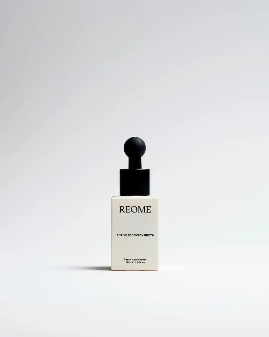 Reome Active Recovery Broth serum concentrate in a cream square bottle with a black ball dropper