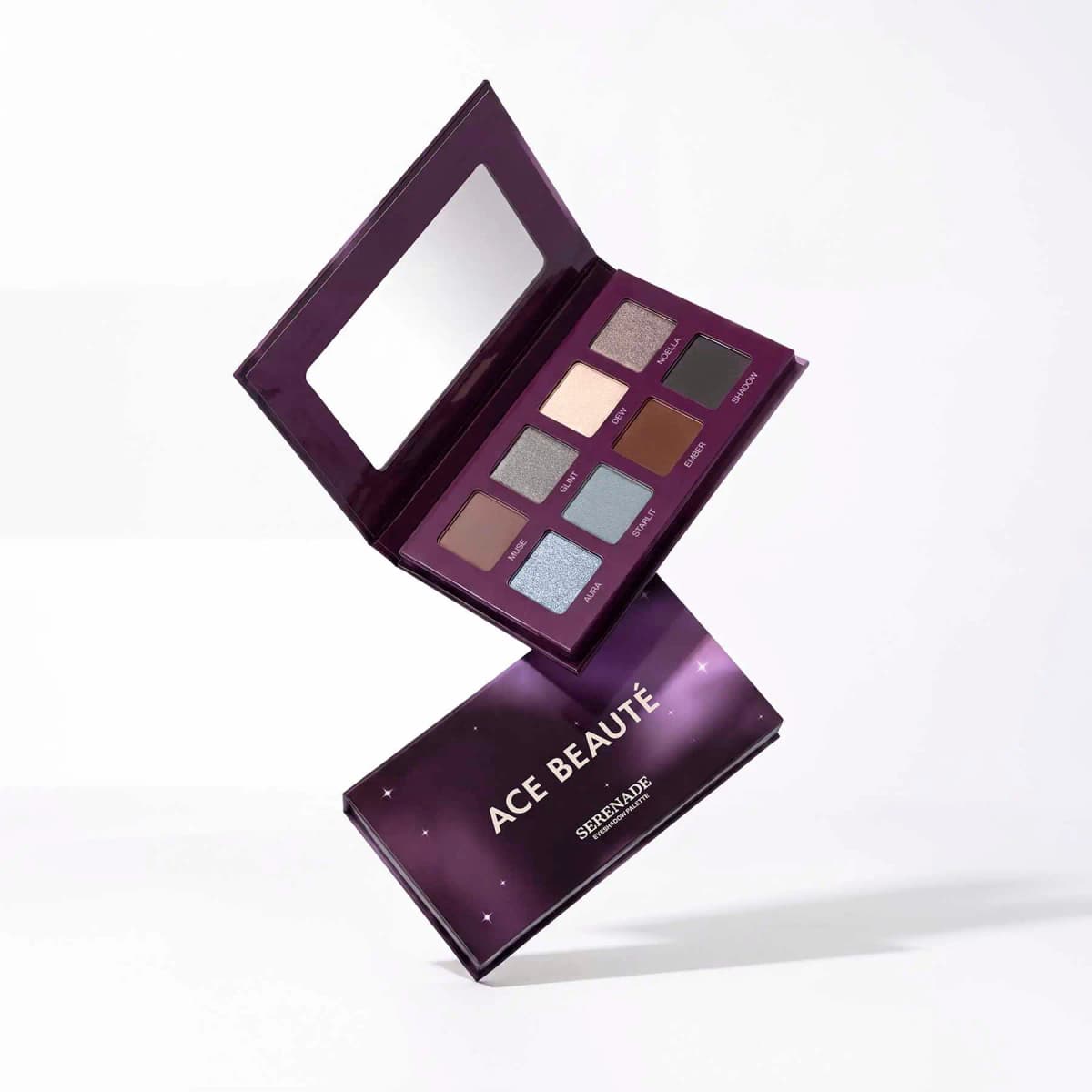 Full-size Ace Beauté Serenade palette open above its purple starry box printed with Serenade Eyeshadow Palette.