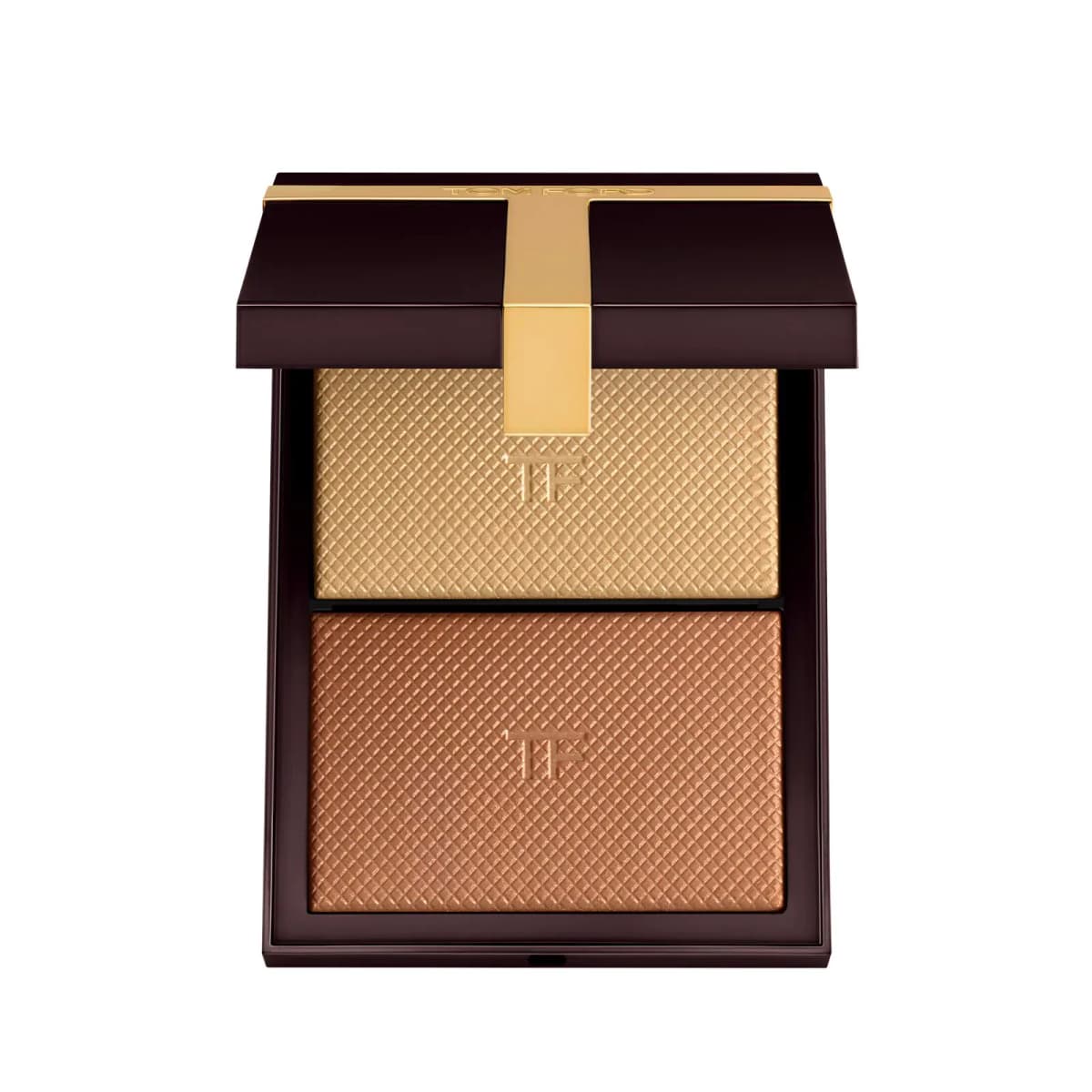 Open Tom Ford compact with a dark brown case holding a pale gold highlight above a warm copper-bronze powder