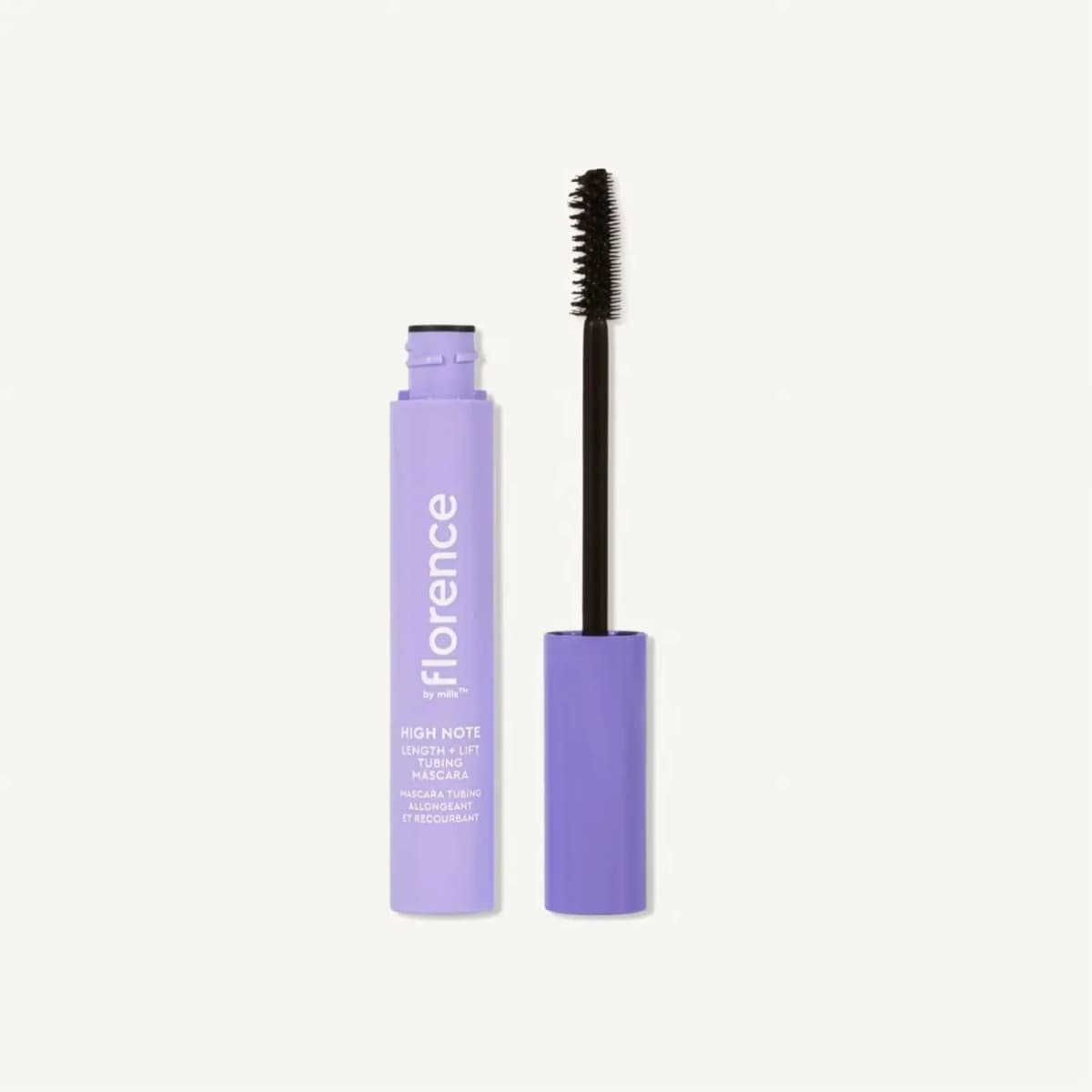 Florence by mills High Note Length + Lift Tubing Mascara in an open lilac tube beside its black bristle wand