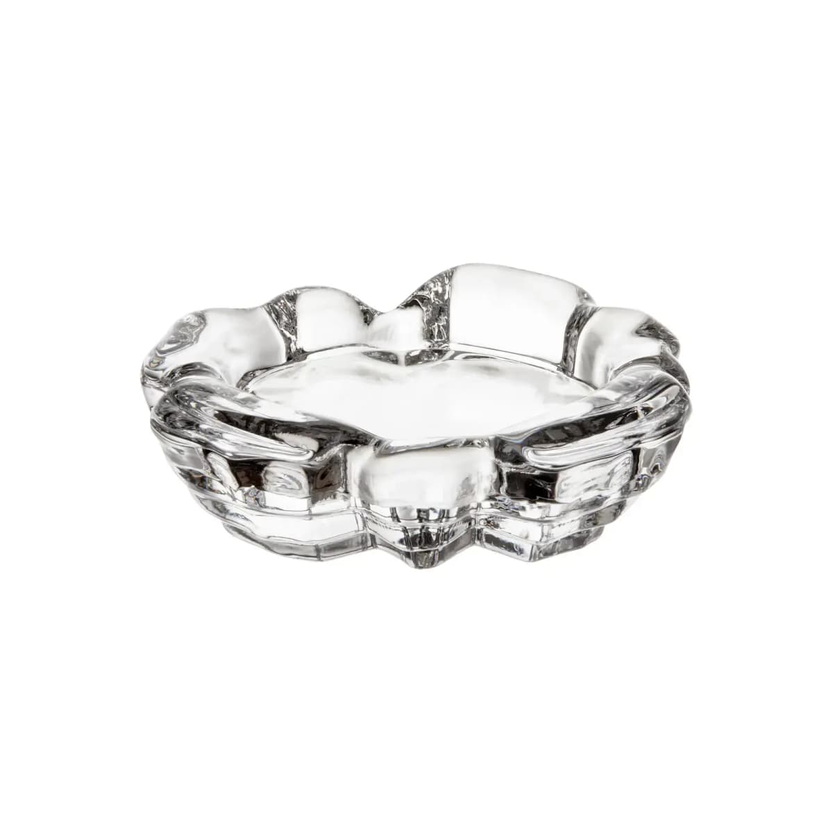 Small clear glass dish with scalloped, chunky rippled edges on white background