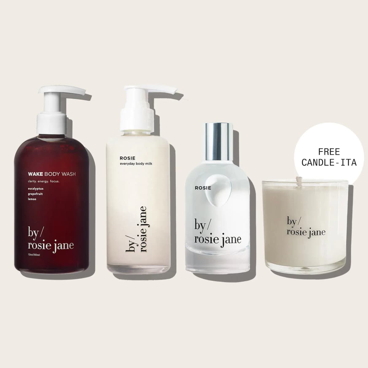 Wake body wash, Rosie body milk, Rosie perfume and a candle with a Free Candle-ita badge on a cream background