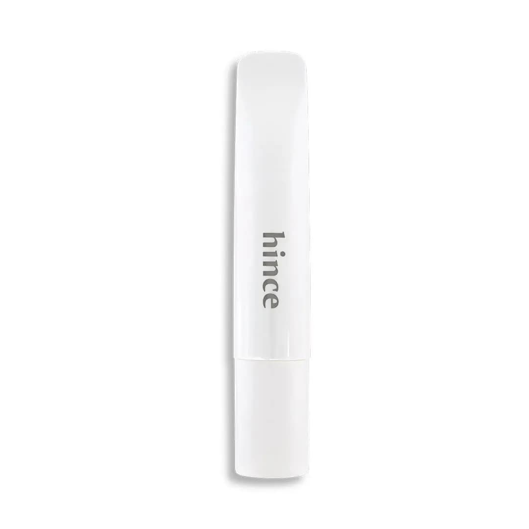White glossy hince lip balm tube with grey logo and white cap