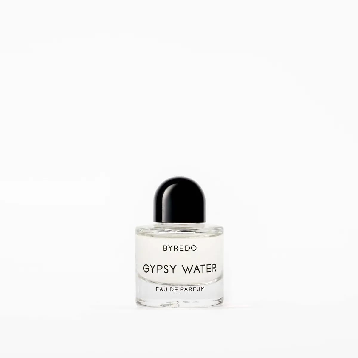 Gypsy Water Eau de Parfum mini bottle with black dome cap against a white background