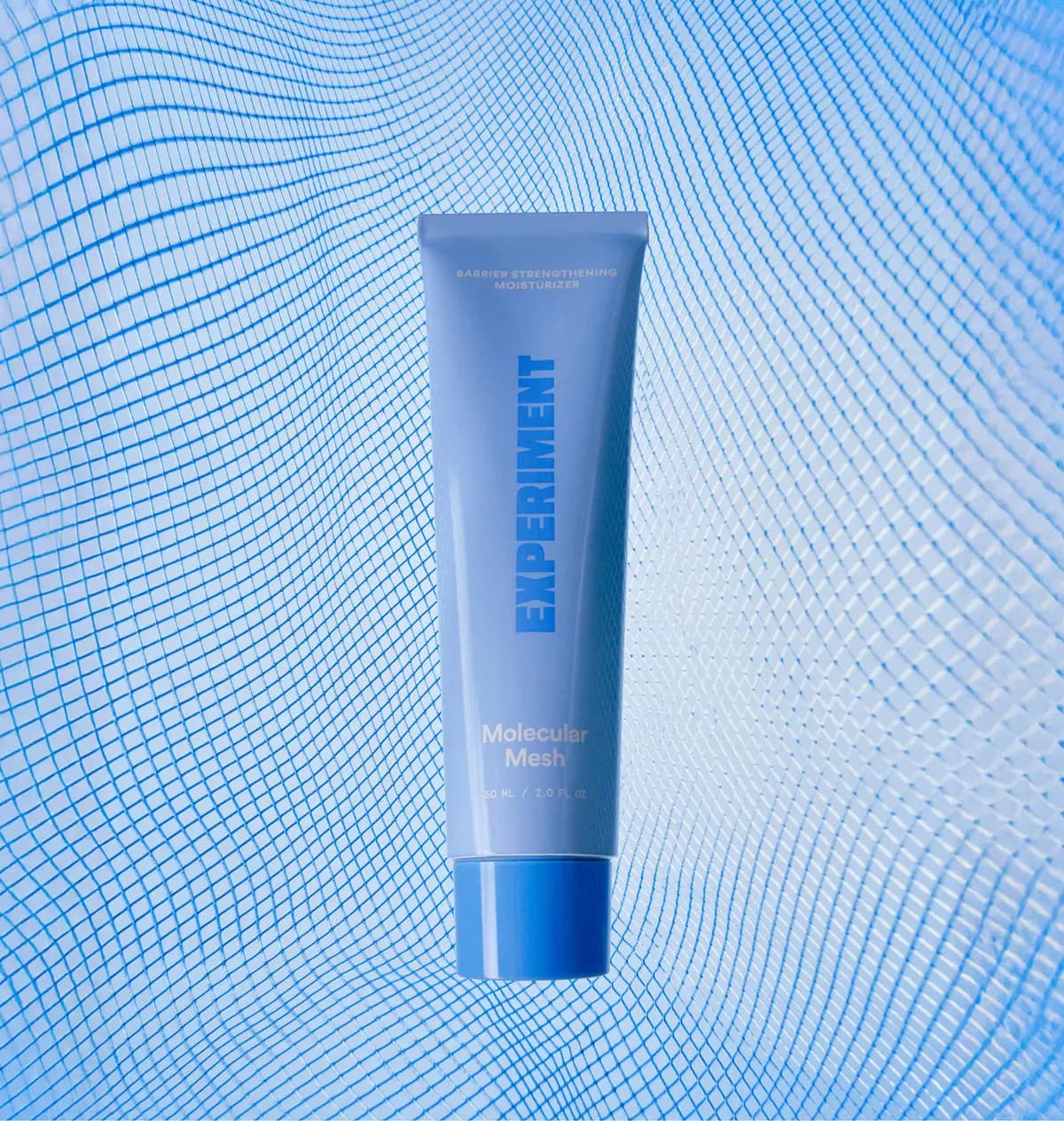 Pale blue Molecular Mesh barrier strengthening moisturiser tube against a rippling blue mesh net backdrop