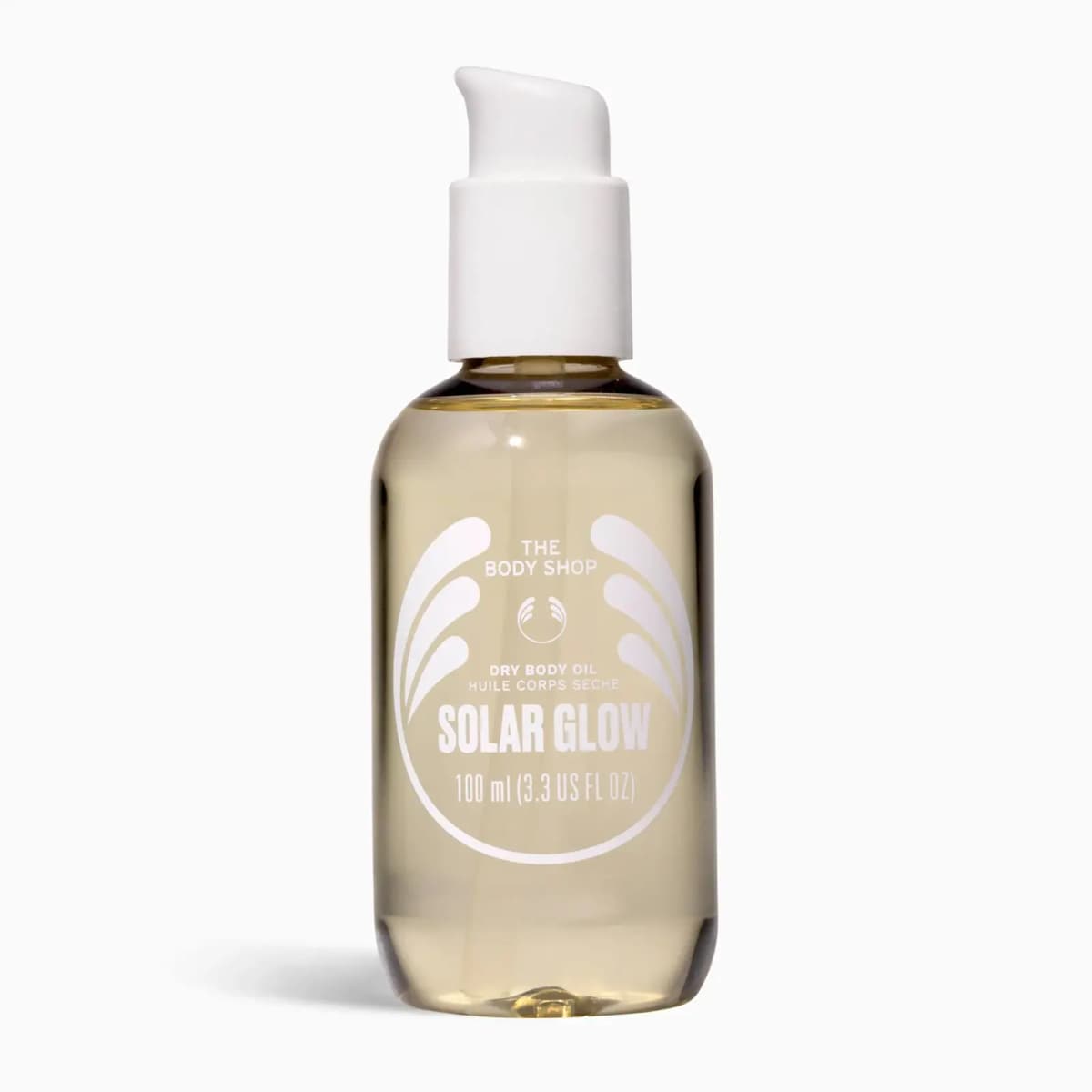 Solar Glow dry body oil in a clear pale yellow pump bottle on a white background