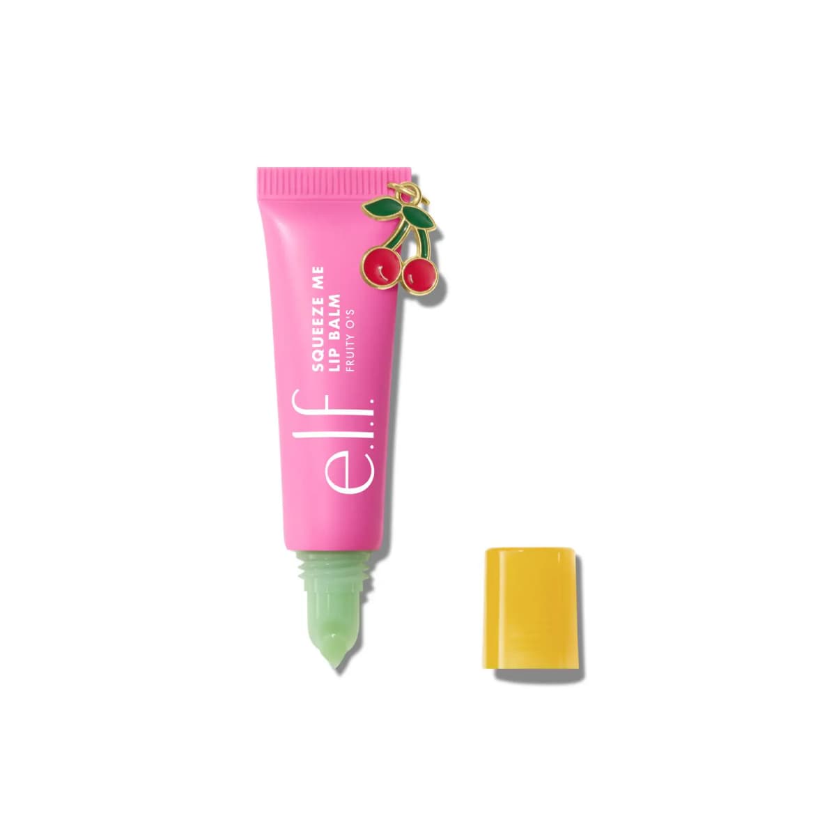 Pink Fruity O's tube with cherry charm, uncapped to show a mint-green balm tip beside its yellow cap