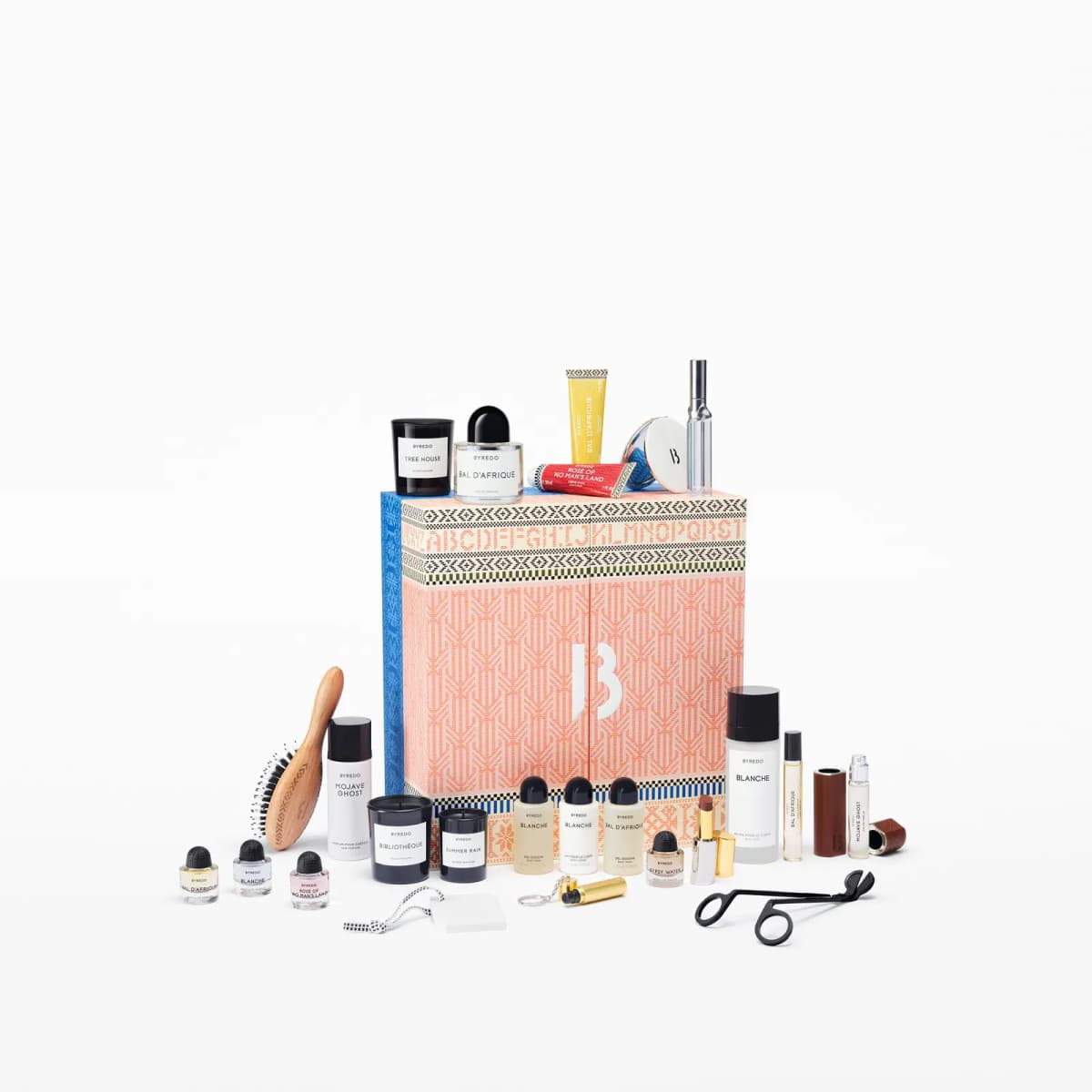 Byredo advent calendar box surrounded by 25 fragrance, body care and accessory products including candles, perfumes