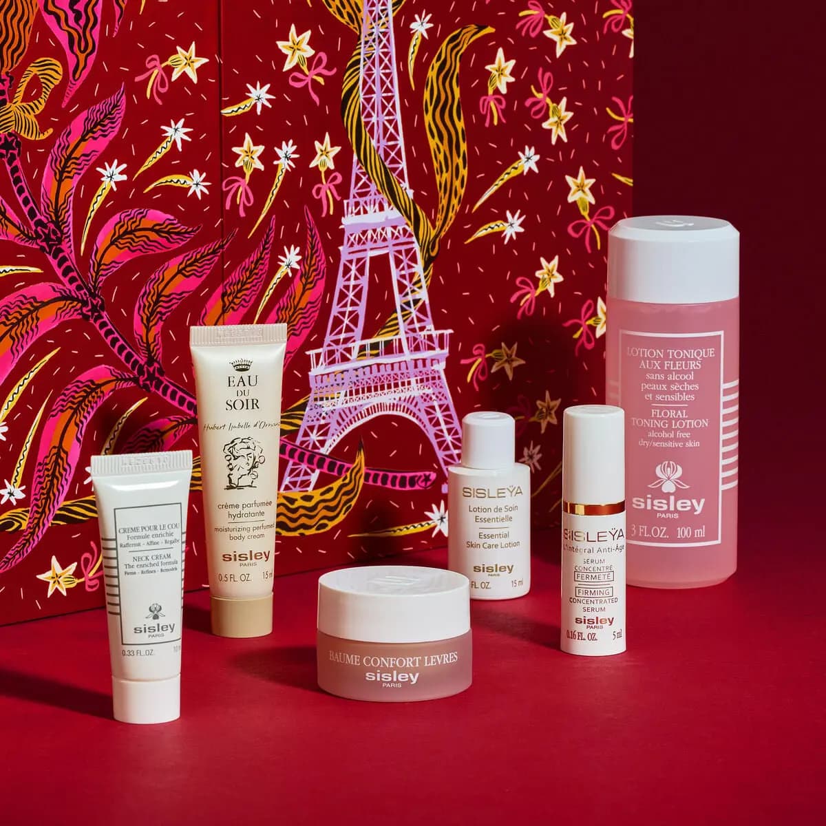 Neck Cream, Eau du Soir body cream, Baume Confort Lèvres, Sisleÿa serum and Floral Toning Lotion before Eiffel Tower art